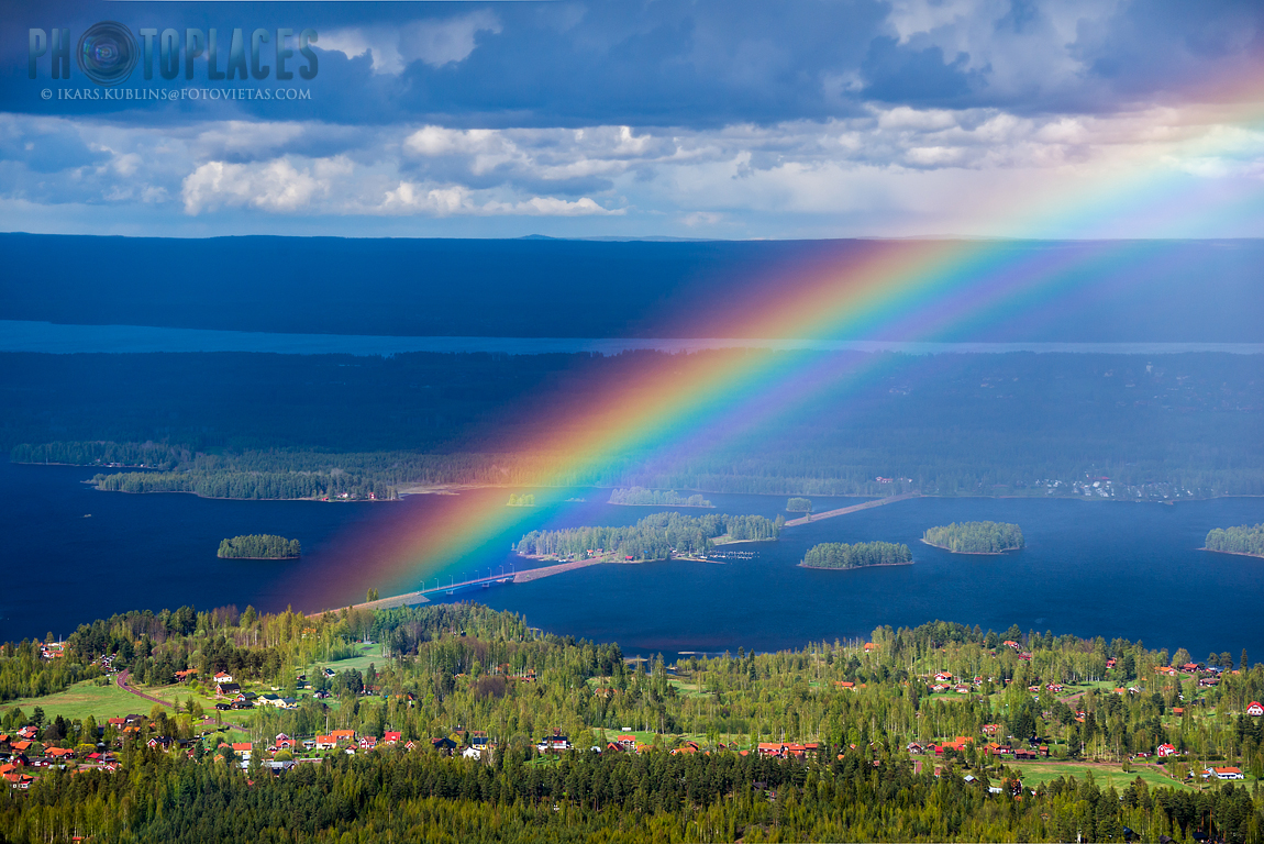 View from Gesundaberget hill to bridge to Solleron island with rainbow